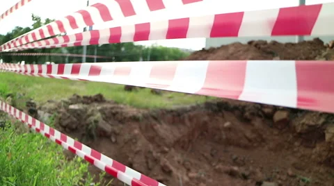 Tape danger sways in the wind.  Stock Footage 69001011