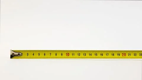 A tape measure. A construction tool. Measuring tape isolated on a white 스톡 사진