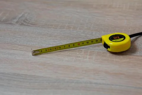 Tape measure on the table. Stock Photos