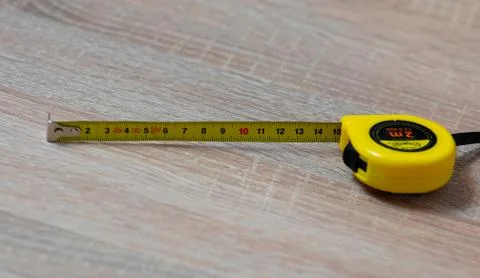 Tape measure on the table Stock Photos