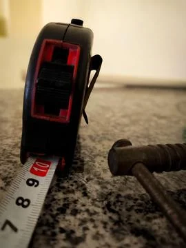 Tape measure on the workbench Stock Photos