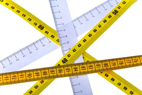 Tape measures cross on white background Stock Photos