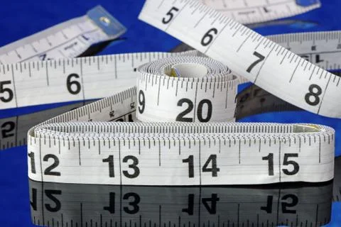 Tape measures with a reflection Stock Photos