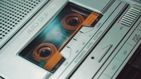 Tape recorder playing back music. Person confessing on a vintage tape recorder. Stock Footage 194845552
