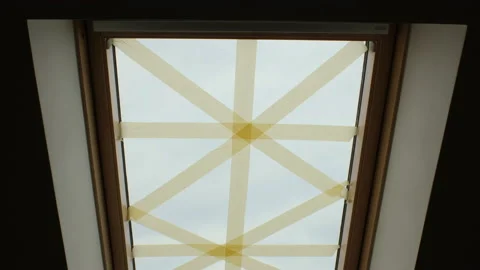 Tape on windows to prevent fragments from explosion during the war in ukraine Stock Footage 174851448