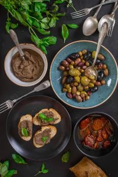 Tapenade and assorted provence snacks Stock Photos