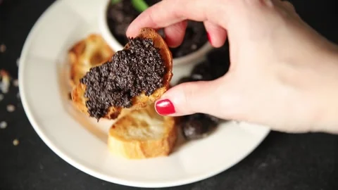 Tapenade black olives olive spread ready to eat tasty snack fresh gourmet food Stock Footage 336678486