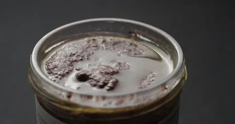 Tapenade bottle opening slow motion, vertical view Stock-Footage 280523256