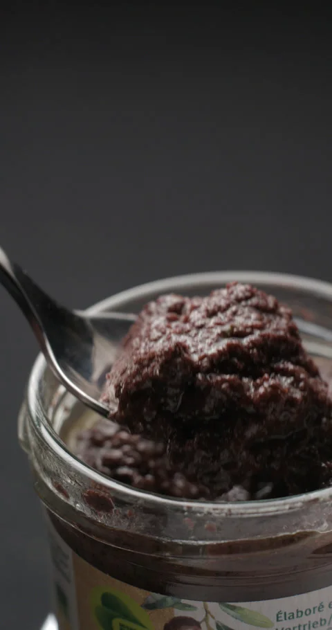 Tapenade  tasting slow motion, vertical view Stock Footage 280523319
