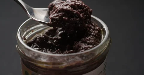 Tapenade  tasting slow motion, vertical view Stock Footage 280570942