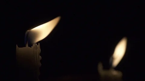 Taper candles flicker in slow motion Stock Footage 101113328