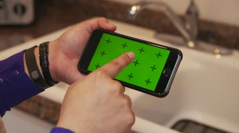Tapping and Swiping iPhone 6 Green Screen in House Kitchen Stock-Footage 46080031