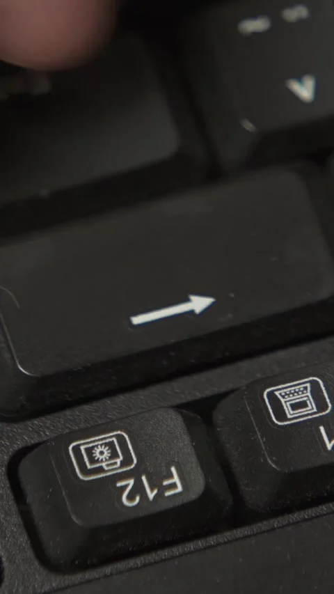 Tapping backspace key close up macro Stock Footage 336269768