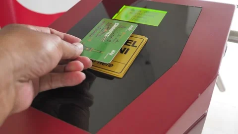 Tapping electronic money card payment commuter line Kereta Api Indonesia KRL Stock-Footage 158463779