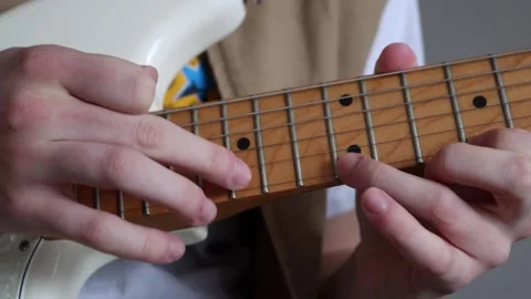 Tapping a guitar Stock Footage 333463123