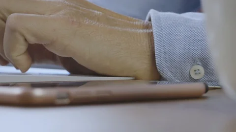 Tapping laptop close up. Man hands typing on the keyboard. Working from home by  Stock Footage 128115757