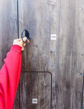 Tapping Lock on Locker with Access Wristband Stock Photos