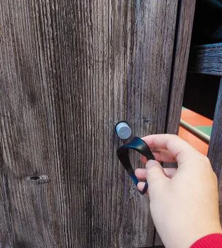Tapping Lock on Locker with Access Wristband Stock Photos