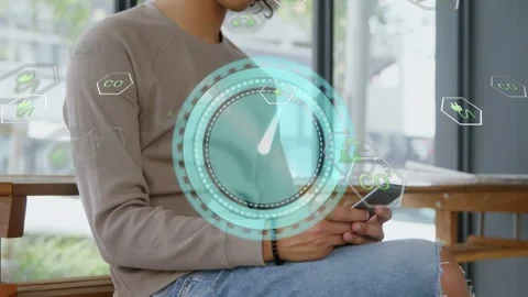 Tapping smartphone, man in pullover and ripped jeans using AR HUD on stool by Stock Footage 332804673