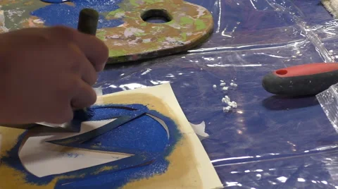 Tapping the stencil with brush 스톡 동영상 48065522