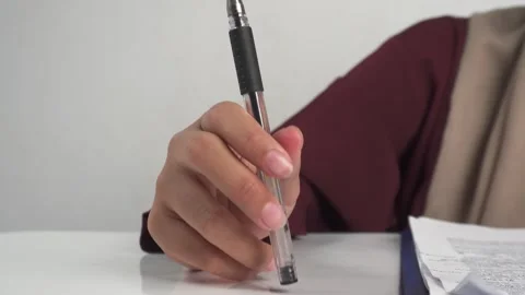 Tapping on the table with a pen Stock Footage 277242018