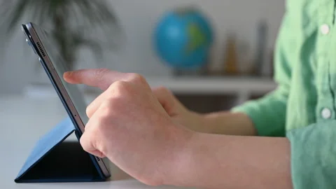 Tapping tablet closeup during online course Video stock 168528738