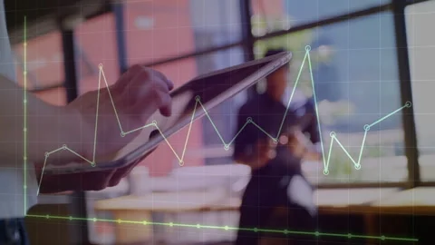 Tapping tablet touchscreen, hands tracking data trends on grid overlay while Stock Footage 311455095