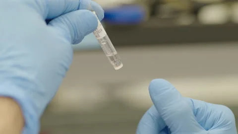 Tapping vial Stock Footage 161257064