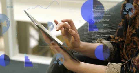 Tapping woman's hands using slim tablet at office lounge, patterned sleeve and 스톡 사진
