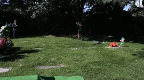 Taps being played at a grave side funeral. Stock Footage 12242582