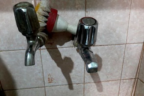 Taps with Knobs over Kitchen Sink Stock Photos