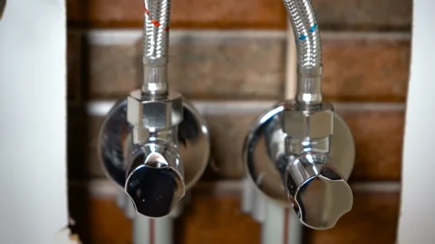 Taps with pipes under the sink Stock Footage 119764436