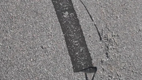 Tar on asphalt road bitumen pattern 스톡 동영상 111818824