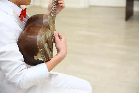 Tar string instrument . Man playing on a classical folk instrument tar of Aze Stock Photos