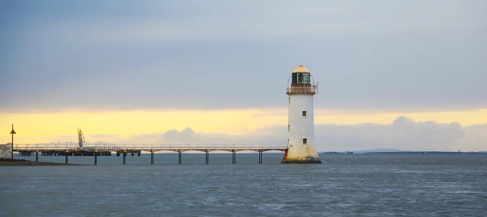 Tarbert Lighthouse on sunset Stock Photos