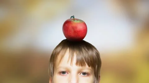 Target. Arrow capturing red apple from head. Colorful background. Stock Footage 8949531