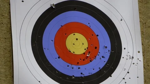 A target being hit by two arrows Stock Footage