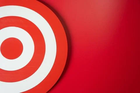 Target circle on a red background. Goal and planning concept. Marketing and t Stock Photos