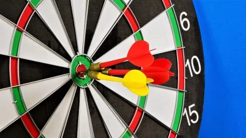 Target Darts. Regular accurate hit on the target. Stock Photos
