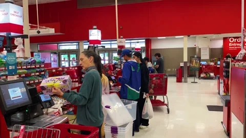 Target Department Store interior, customers at self checkout counters Stock Footage 309542890