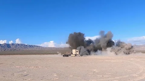 Target hit by weapon fired from A-10 Thunderbolt II aircraft in Nevada desert Stock Footage 227138391