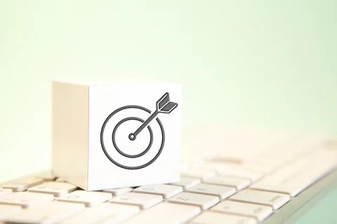 Target icon on white paper box on computer keyboard, business success concept Stock Photos