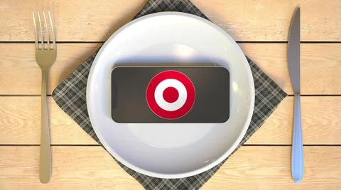 TARGET logo on the screen of mobile phone on the plate. Editorial food delivery イラスト素材
