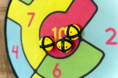 The target is multi-colored with balls in the center Stock Photos