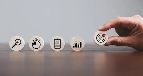 Target or goal with strategy plan, success business revenue concept. Symbols Stock Photos