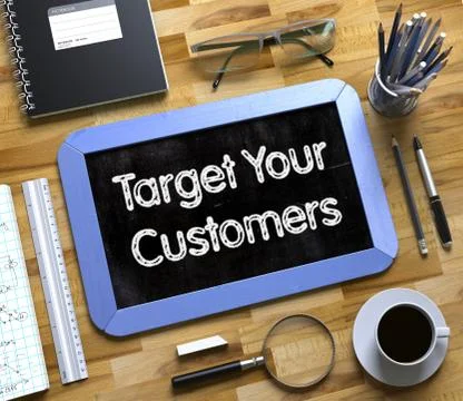Target Your Customers - Text on Small Chalkboard Stock Illustration