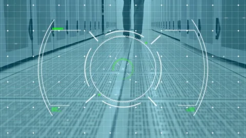 Targeting animation over person walking in data center, focusing on technology Stock Footage 304307983