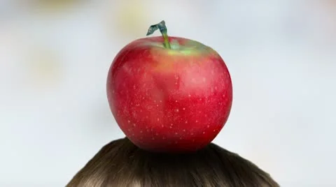 Targeting. Red apple on head hit by arrow. Colorful background.  Stock Footage 8966590