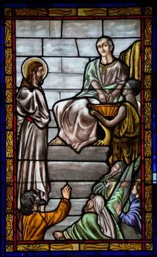 TARGU MURES, ROMANIA - Feb 26, 2020: Stained glass representing Jesus to Pila Stock Photos