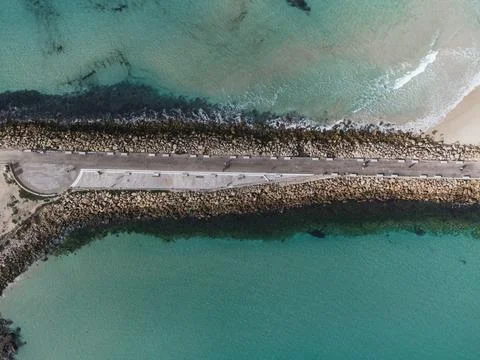 Tarifa causeway separating Atlantic Ocean and Mediterranean Sea Stock Photos